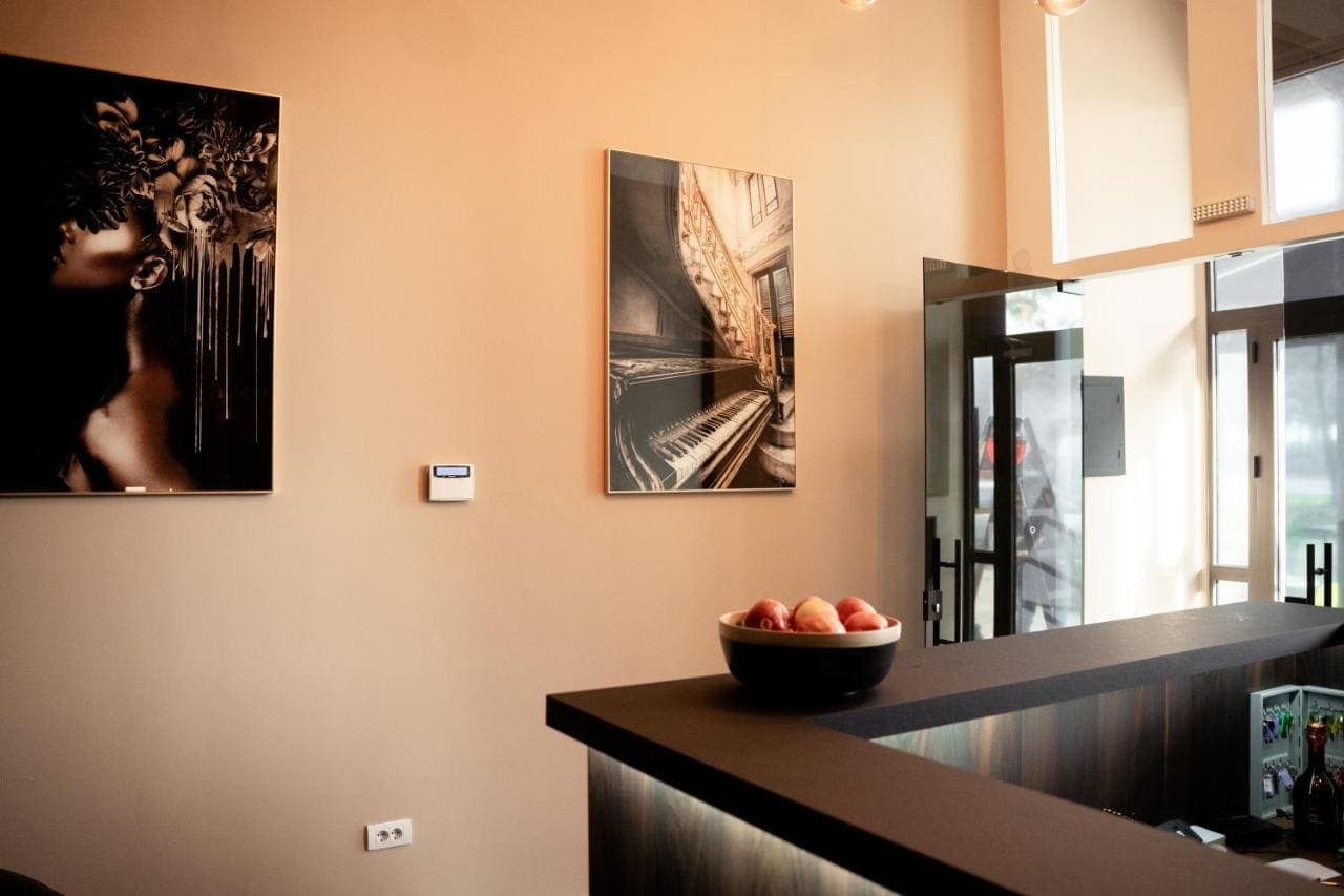 The reception with artwork on the walls