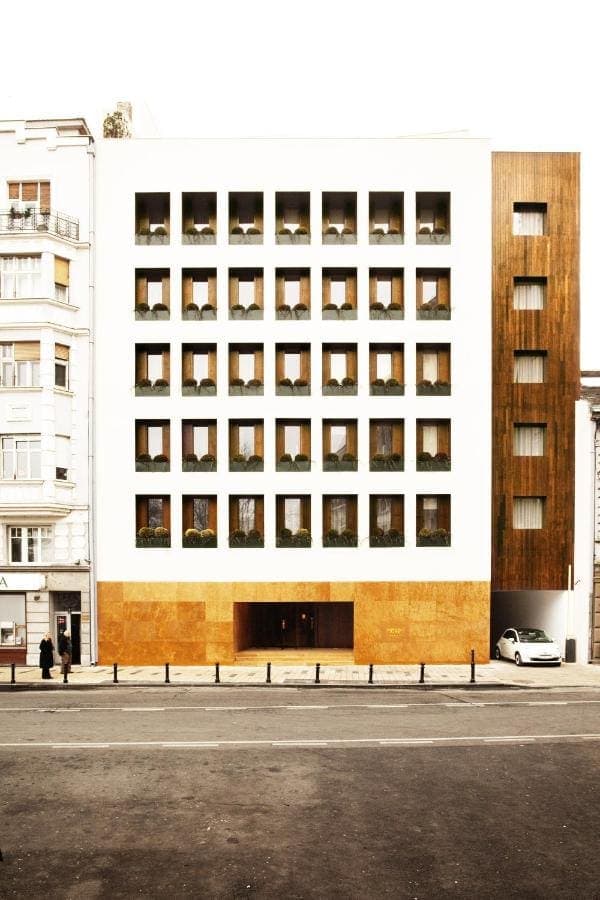 Square Nine's white façade with wooden window boxes